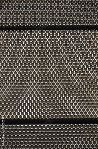 black and white metal grid texture, honeycombs, acoustic system.