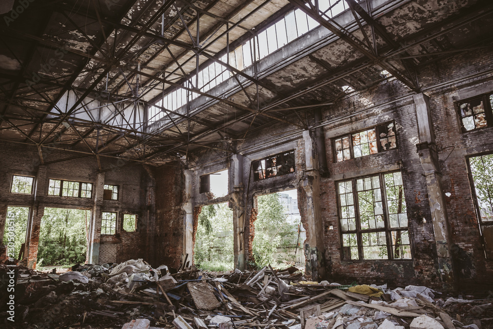 Abandoned and ruined industrial factory building after earthquake disaster or war Abandoned and ruined industrial factory building after earthquake disaster or war