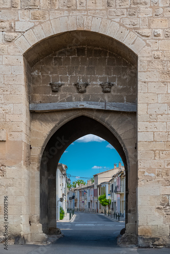 Aigues-Mortes in the south of France, the walls of the city, with typical houses in background
 photo