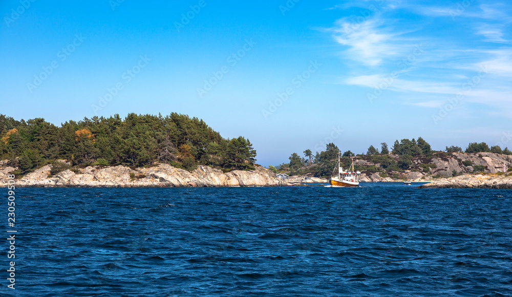 Scandinavian archipelago in summer, beautiful Northern summer day, sailing