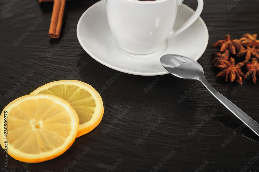 hot tea on black slate square stone hot tea on black slate square stone