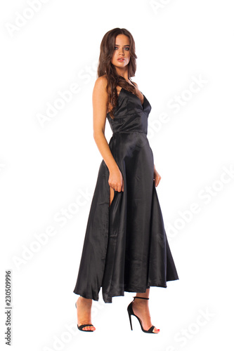 Full body, Young beautiful brunette woman in long black dress