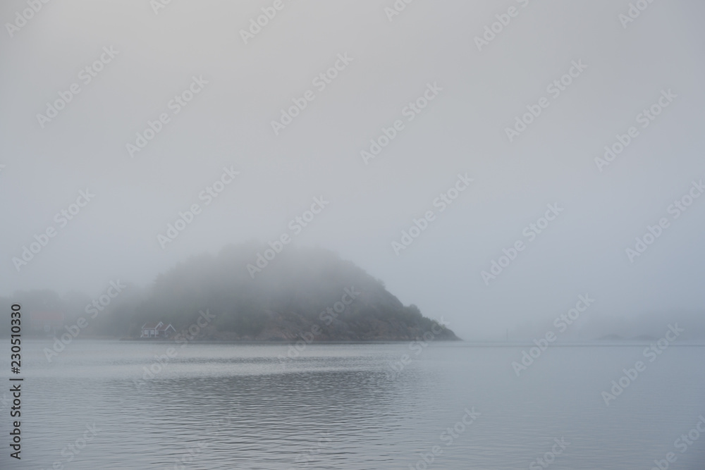 Foggy lanscape, island in the archipelago Foggy lanscape, island in the archipelago