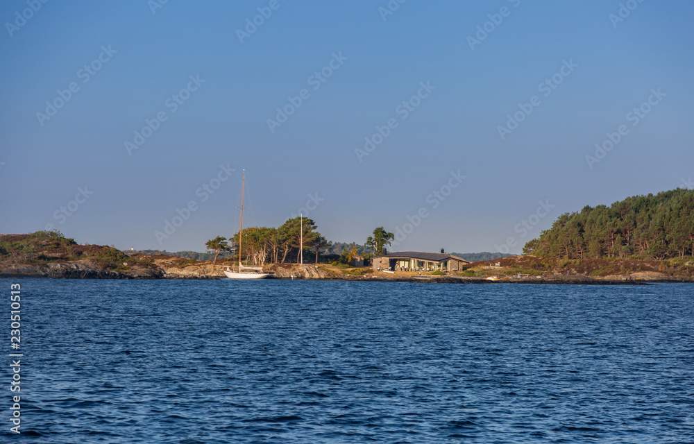 Scandinavian coast archipelago. Sailing in the north 