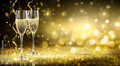 Champagne Flutes In Golden Sparkle Background - Happy New Year
