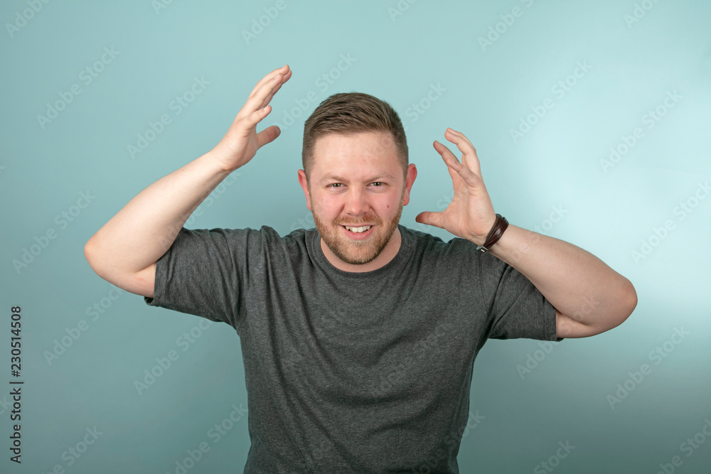Fototapeta premium Frustrated angry man snarling and gesturing
