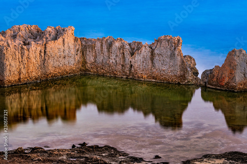 A rock and it s reflection on the water - Ayia Napa