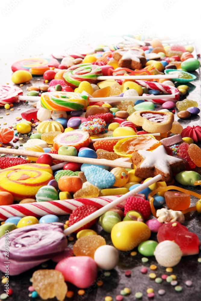 candies with jelly and sugar. colorful array of different childs sweets and treats. candies with jelly and sugar. colorful array of different childs sweets and treats.