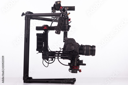 Sistem stabilization video camera and lens on steady equipment support such as gimbal steady or stabilized. White background
