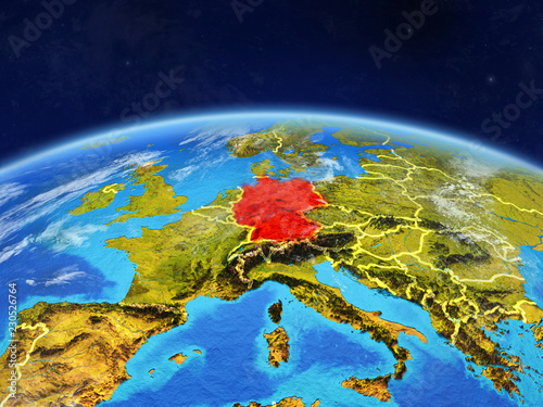 Germany on planet Earth with country borders and highly detailed planet surface and clouds.