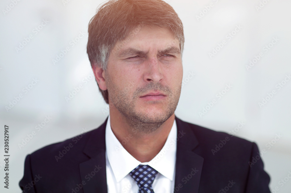 Portrait of a smiling successful businessman. Portrait of a smiling successful businessman.