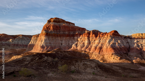 Rainbow City  Wucai Cheng. Colorful Red  Pink  Orange and Yellow landforms in the desert area of Fuyun County - Altay Perfecture  Xinjiang Province Uygur Autonomous Region  China. Rainbow Mountains