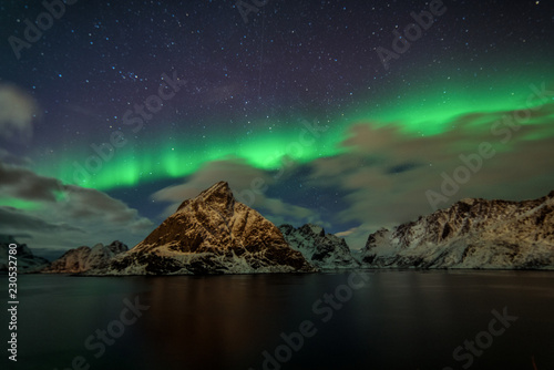 Obraz na płótnie Northern Lights in the mountains of Reine, Norway. Lofoten Islands w salonie