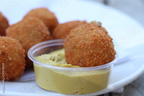 Dutch snack: Bitterballen with mustard photo