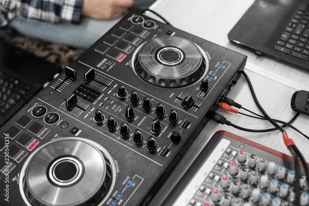 DJ remote control. Dj audio controller. Electronic turntable. DJ remote control. Dj audio controller. Electronic turntable.
