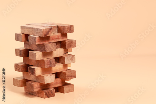 Wooden block stacking, Financial and Business growth concept using as background