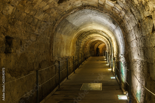The Templar tunnel in the underground old town of Acco Israel. © olegmayorov