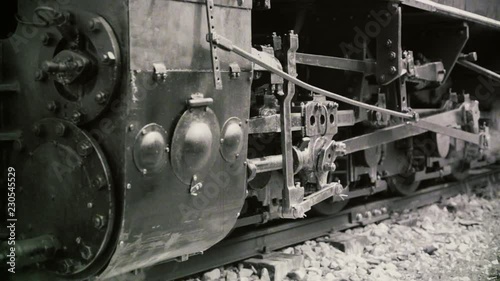 Old steam train stationing. Wheels detail photo