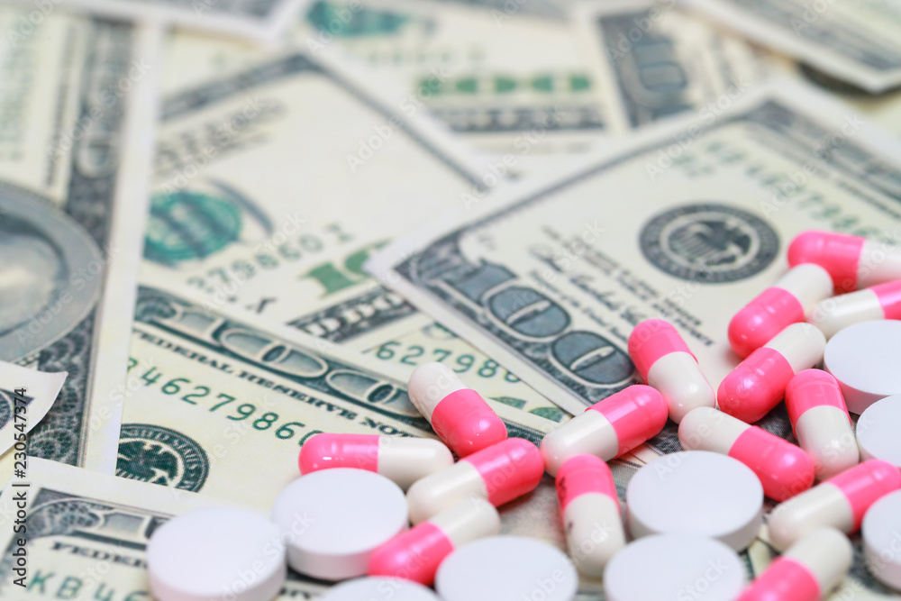 medicine on money background . medicine on money background .