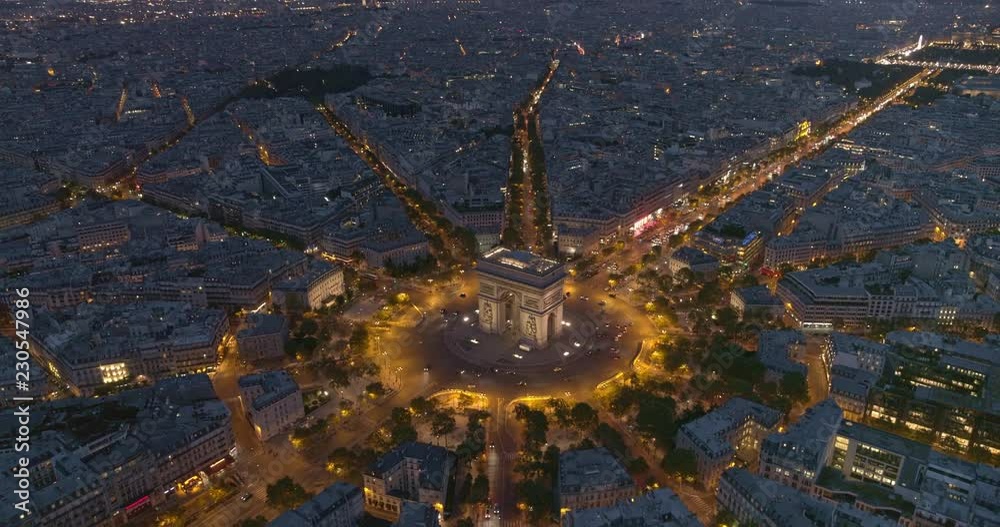 France Paris Aerial v58 Flying over Place Charles de Gaulle looking down at Arc de Triomphe to cityscape view 8/18