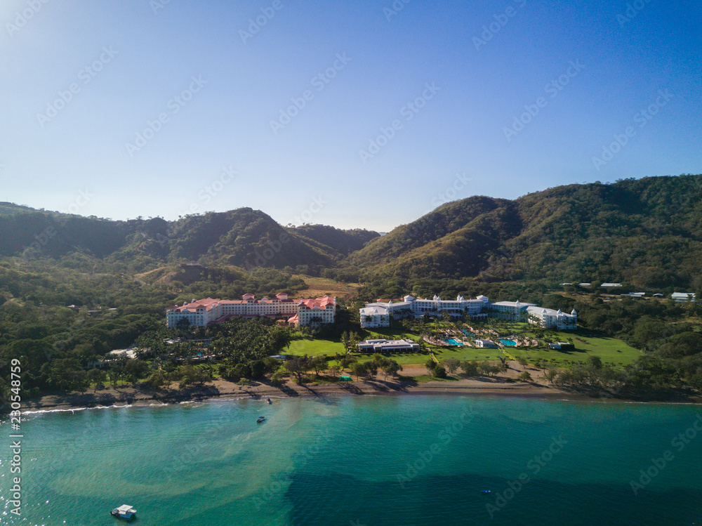 Aerial drone photo of resort hotels on the Pacific Ocean coastline of Costa Rica