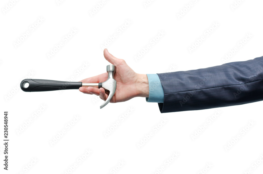 Male hand is holding a hammer isolated on the white background. Build your business.