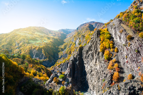 Incredible landscape - view of the mountain range with yellowed trees and gorges