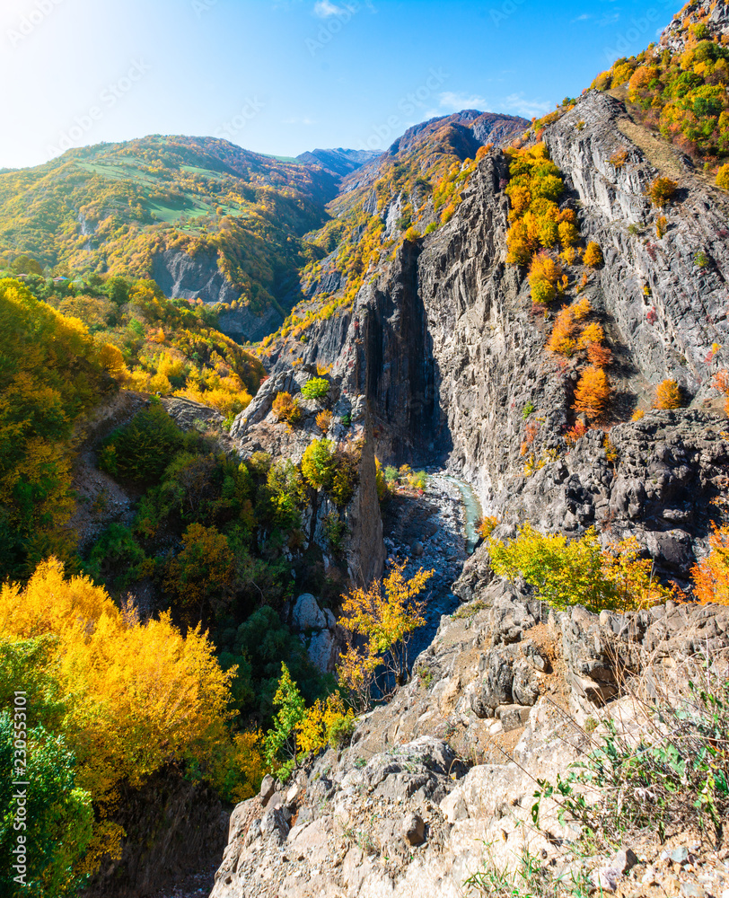 Obraz premium Incredible landscape - view of the mountain range with yellowed trees and gorges