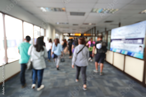 blur image of passengers in airport terminal