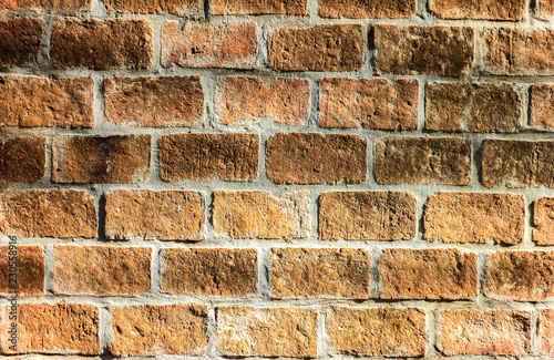 texture of old red brick masonry.