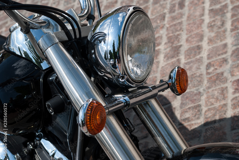 Headlight and front of the motorcycle close-up