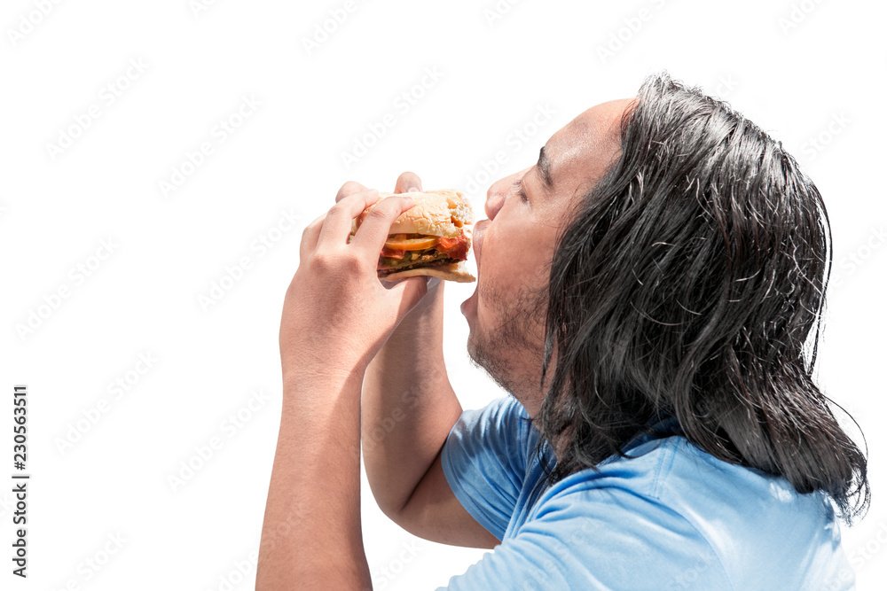 Portrait of asian fat man eating hamburger Portrait of asian fat man eating hamburger