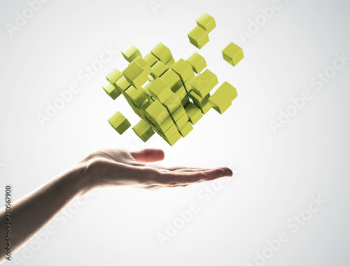 Cube color figure in male palm as symbol for integration. 3D ren