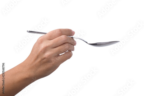 Female Hand Holding Spoon