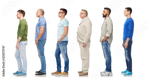 diversity and people concept - group of happy multiracial men standing in queue, isolated on white photo