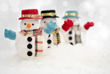 Snowman is standing in snowfall, Merry Christmas and happy New Year concept