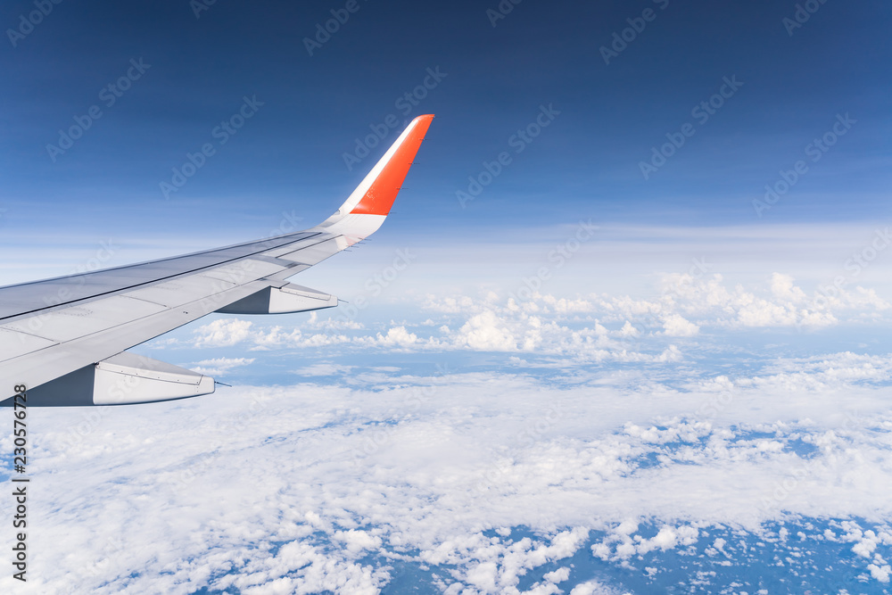 Beautiful view from airplane window and blue sky on nice sunny day, This time in altitude during flight. Beautiful view from airplane window and blue sky on nice sunny day, This time in altitude during flight.