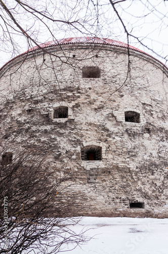 Defensive fortress windows on round fortress facade © YKD