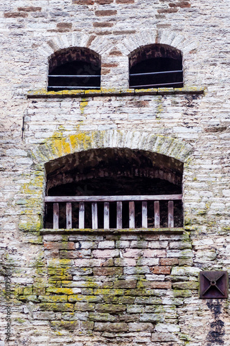 Funny part of the fortress wall. Facial expression of an inanimate object.