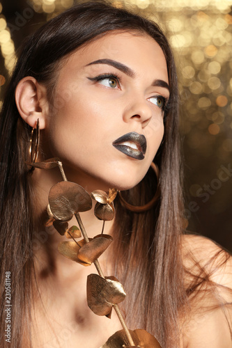 Beautiful young woman with ...