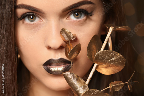 Beautiful young woman with ...