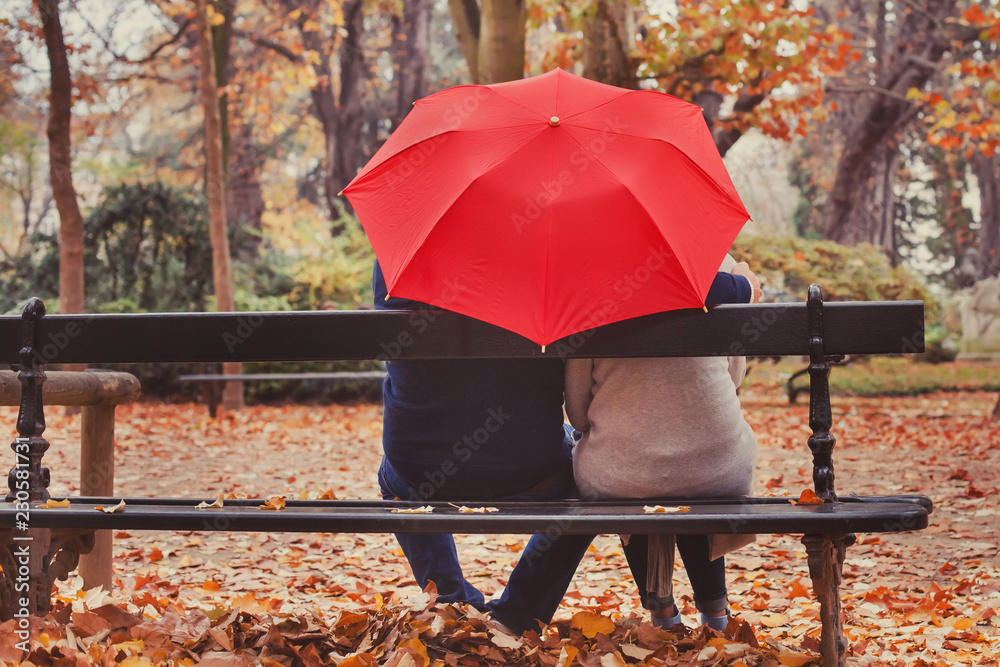 Obraz premium love, happy elderly couple in love, retired people enjoying romantic moment in autumn park, fall season