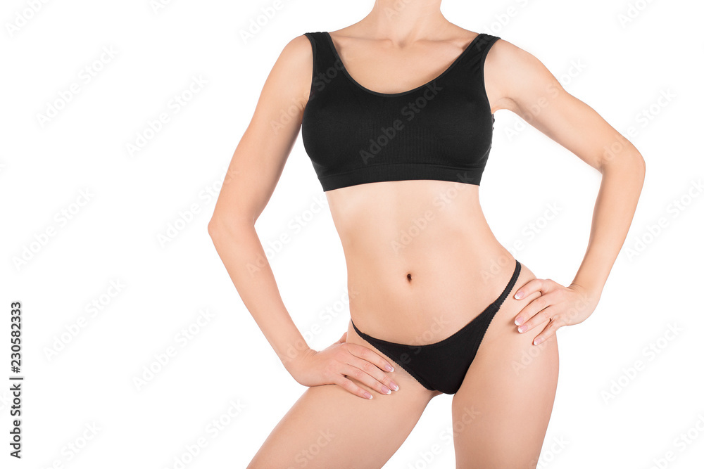 Female cropped fit body in black base underwear, isolated on white. Female cropped fit body in black base underwear, isolated on white.