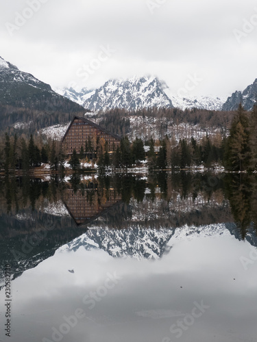 Mirror on the lake. Mirroring on Strbské Pleso in the High Tatras. Mirroring in mountains.