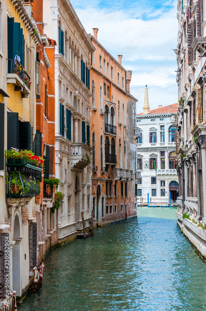 Colorful water canal street in Venice Italy