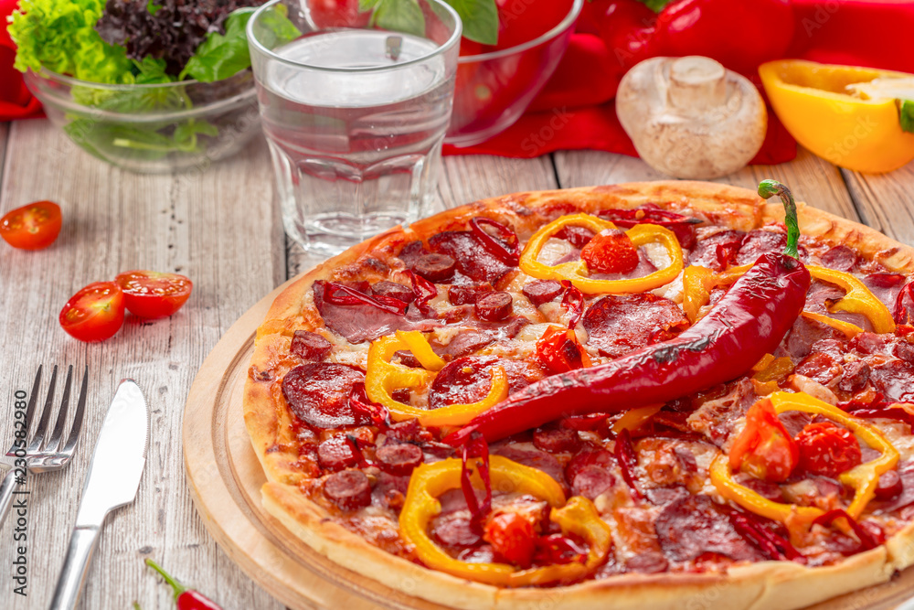 Homemade cheese pizza with salami Homemade cheese pizza with salami