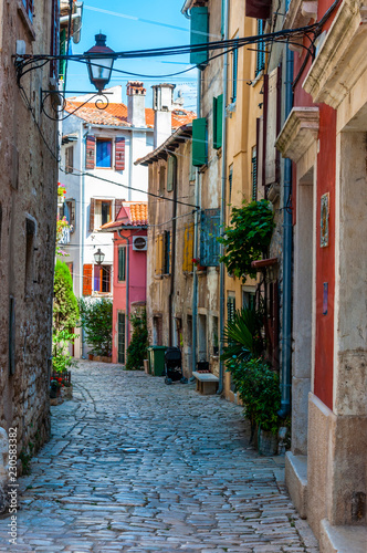 Cozy Old Town paving stone street in Rovinj Istria Croatia