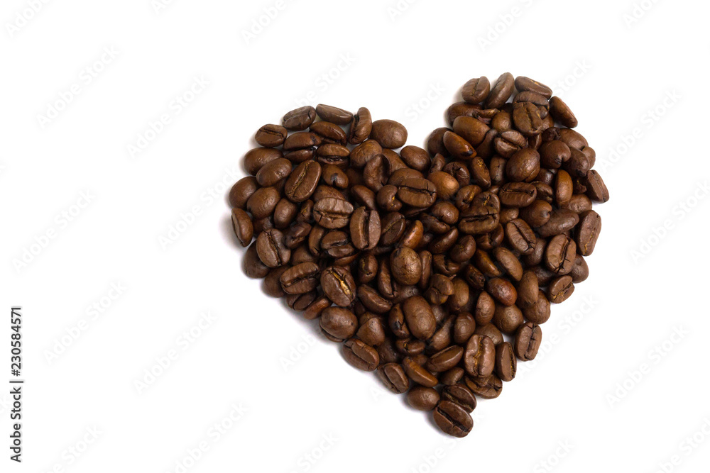 Heart made of coffee beans top view. Love coffee background isolated. Heart made of coffee beans top view. Love coffee background isolated.