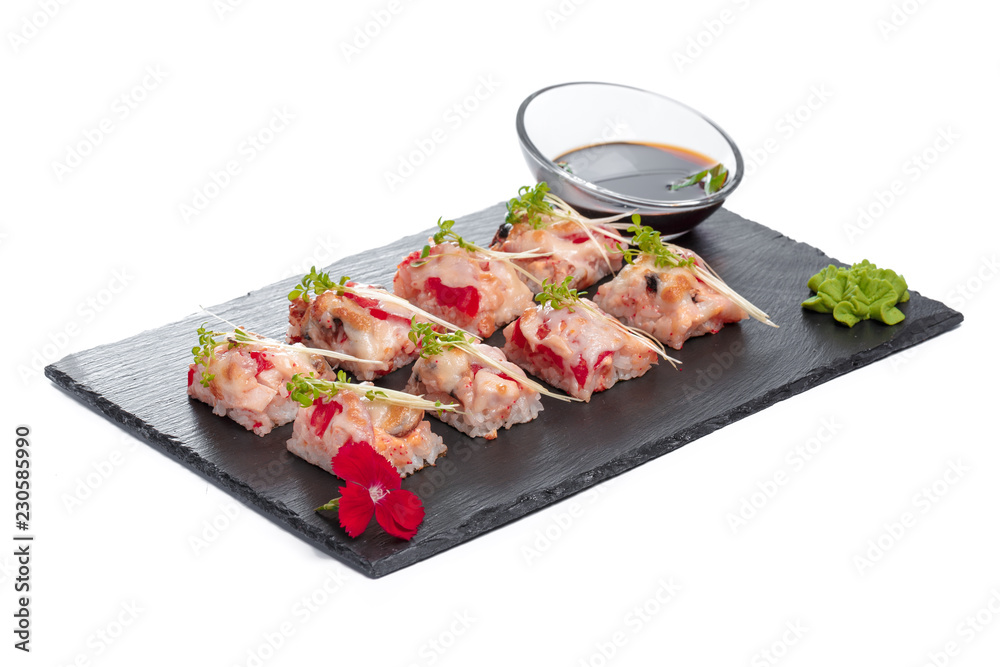 Black rectangle plate with sushi, isolated on white Black rectangle plate with sushi, isolated on white