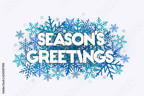 Season's Greetings concept with snowflakes in the background. Decorative design with snow burst. 